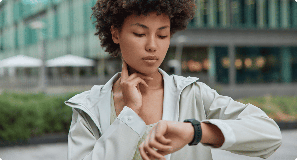 Woman checking pulse